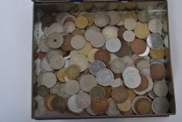 A collection of 20th century and other world coins and tokens to include motoring, European etc.