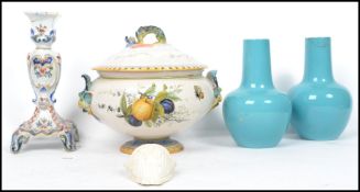 A collection of ceramics to include a pair of monochrome Celadon Chinese vases, a faience, candle