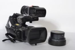 A contemporary Sony Alta Cine PMW - EX3 professional cinematic film camera together with a Sony Wide