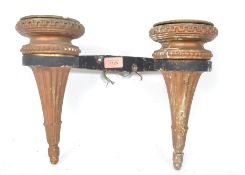 An early 20th century 1920s Art Deco Olympia style wall lamp having two twin gilt sconces in the