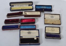 A collection of antique vintage jewellery stick pin boxes to include Martin Co Cheltenham, Cival