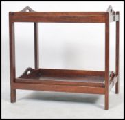 A Georgian revival mahogany two tray / twin tier butlers serving trolley stand. Each tray with