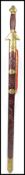 A 20th century Oriental decorative dress sword of large form having carved wooden handle with