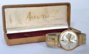 A vintage mid century Gents Accurist gold 21 jewel shockmaster wristwatch having qtr baton numerals,