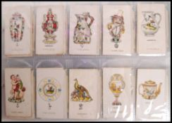 Cigarette Cards: An album of assorted vintage cigarette cards, some complete sets, others part