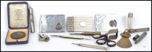 A collection of vintage curio's to include silver plated stamp cases, mother of pearl cheroot
