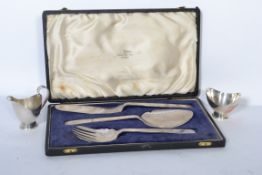 An Art Deco cased Walker and Hall silver plated fish and salad serving set together with a modernist