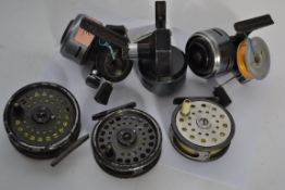 A group of vintage fishing reels to include three ABU 506 closed face fixed spool reels, three