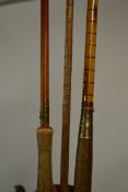 A collection of 3 vintage split cane fly fishing rods, each within original canvas cases to