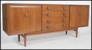 An Ensign pattern elm sideboard by Bristow & Towns