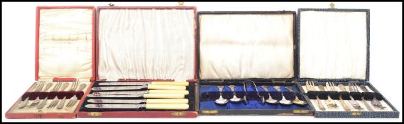 A collection of cased flatware to include dessert forks, fruit knives, tea spoons etc. Widest box