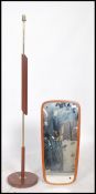 A vintage teak wood framed wall mirror of angular form being frameless together with a retro teak