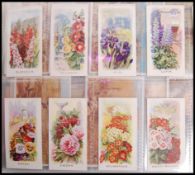 Cigarette Cards: An album of assorted vintage cigarette cards - all full sets. From a large