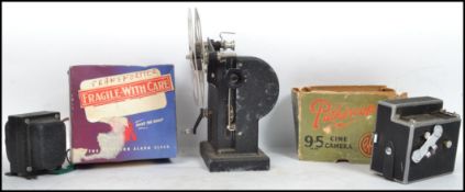 A vintage 20th cinematography Pathescope boxed 9.5mm cine camera and Ace projector, also boxed.