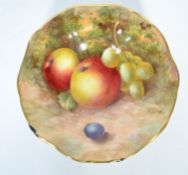 A 20th century Royal Worcester bone China scalloped raised dish painted with apples and grapes