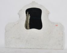 A late 19th early 20th century marble mantel wall mirror. Constructed from a single shaped piece