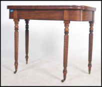 A 19th century Regency revival mahogany tea table