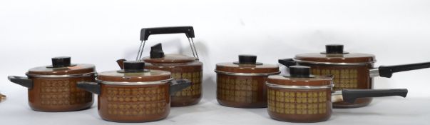 A collection of vintage 20th century steel kitchenalia cooking pots and pans by Marquess of
