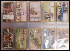 Cigarette Cards: An album of assorted vintage cigarette cards, all complete sets. From a large