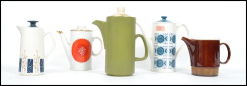 A collection of 5 vintage / retro ceramic teapots to include along with others etc (