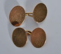 A pair of early 20th Century 15ct gold chain link cufflinks. Marked 15ct, tests 15ct gold. Total