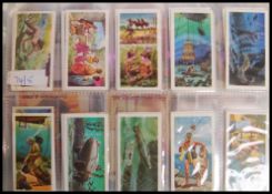 Tea Cards: An album of assorted vintage tea trading cards, all complete sets. From a large private