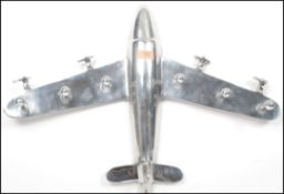 A vintage 20th century Art Deco style retro chrome set of coat hooks in the form of an aeroplane