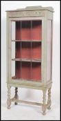 An Edwardian early 20th century oak up-cycled painted display cabinet, single glass door, adjustable