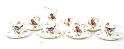 A 1920's Royal Doulton ceramic coffee service consisting of cups saucers, creamer jug and sugar bowl