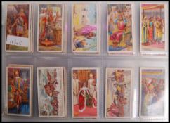 Cigarette Cards: An album of assorted vintage cigarette cards - all full sets. From a large