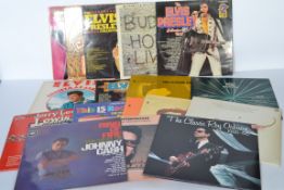 A collection of vinyl long play / Lp album records mainly early Rock 'N' Roll artists to include