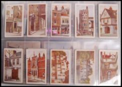 Cigarette Cards: An album of assorted vintage cigarette cards - all full sets. From a large