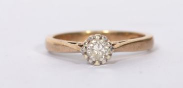 A hallmarked 9ct gold diamond solitaire ring set with a single round cut diamond in a prong