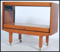 A retro 1970's teak wood  metamorphic buffet / tea