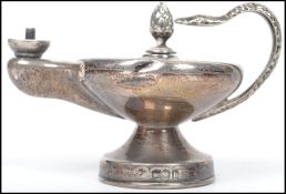 A silver ornate hallmarked Genie's Aladdin lamp oi