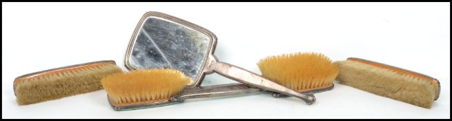 A silver Art Deco hallmarked enamel backed engine