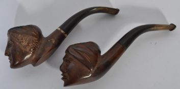 Two early 20th century briar wood pipes having ebo