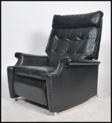 A retro 20th century 1960's black Parker Knoll rec