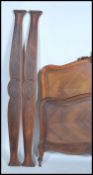 A 19th century French walnut double bed. The head