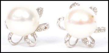 A pair of sterling silver and marcasite large pear