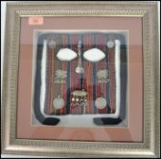 A framed and mounted fabric face veil of probable