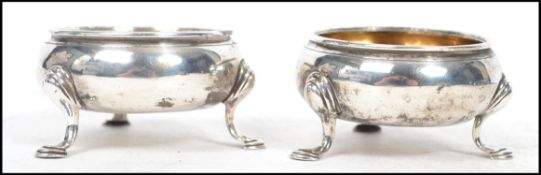 A matched pair of circular Georgian hallmarked sil