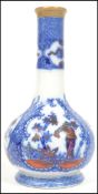A 19th century English blue and white baluster vas