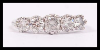 An 18ct white gold five stone diamond ring having