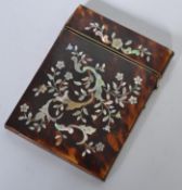 A 19th century tortoise shell card case having an
