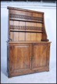 A 19th century large French country oak dresser ra