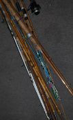 A collection of vintage fishing rods to include Al