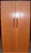 A G-Plan kelso double wardrobe together with a mat