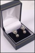 A pair of gold and south sea pearl drop earrings c