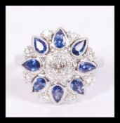 An 18ct white gold Art Deco style sapphire and dia